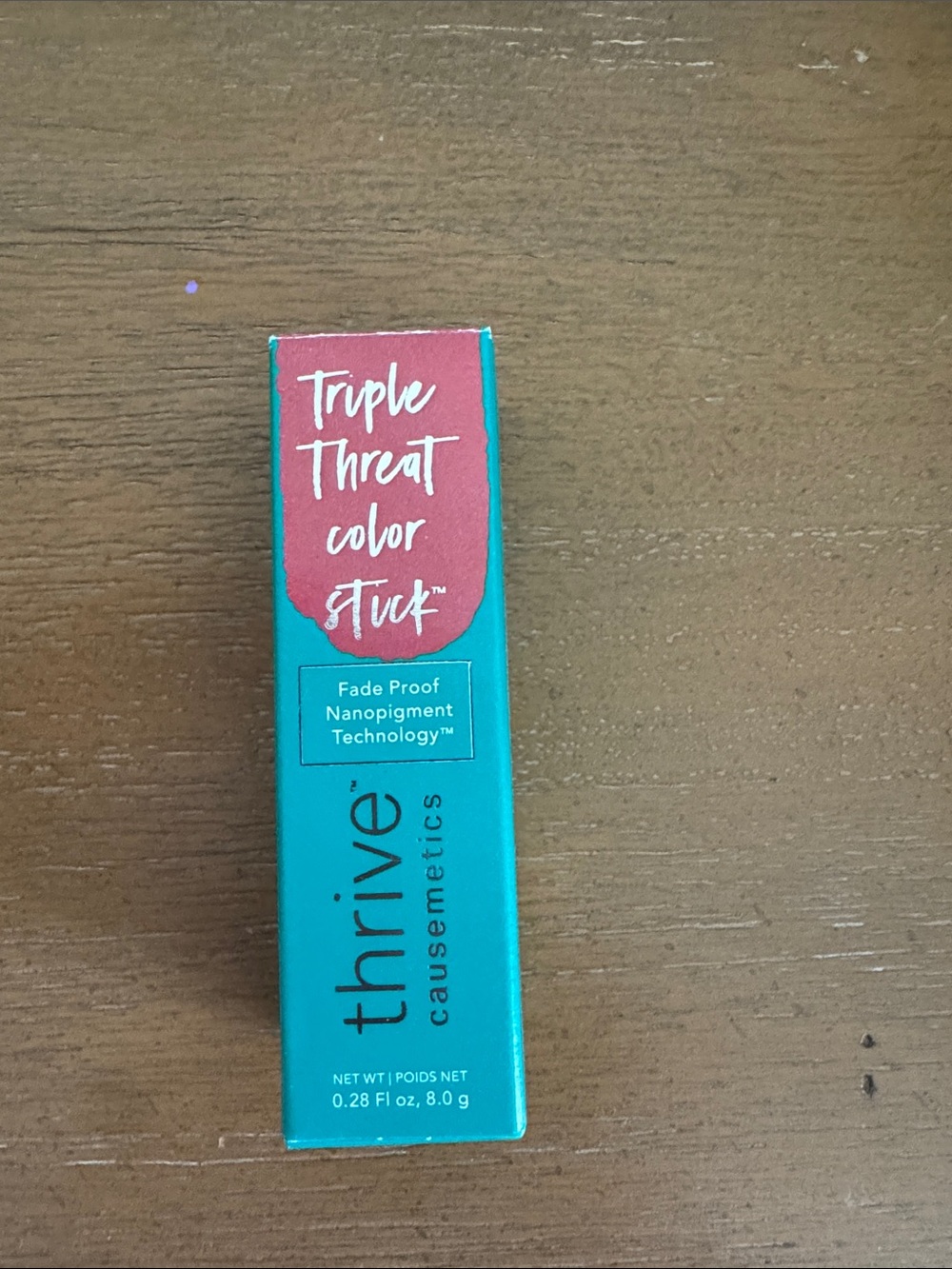 thrive causemetics Triple Threat Color Stick - Teal & Coral Red
